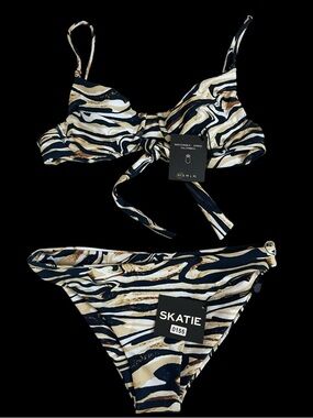 NWT SKATIE Bikini Set XS 🔥
Kate Top $83 + Dylan Bottom $71 (Retail $154!)